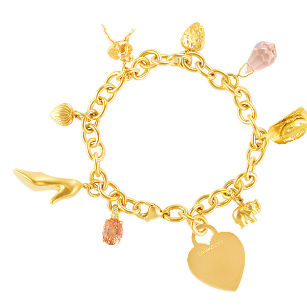 Charm bracelet in 18k yellow gold | Gray & Sons Jewelers