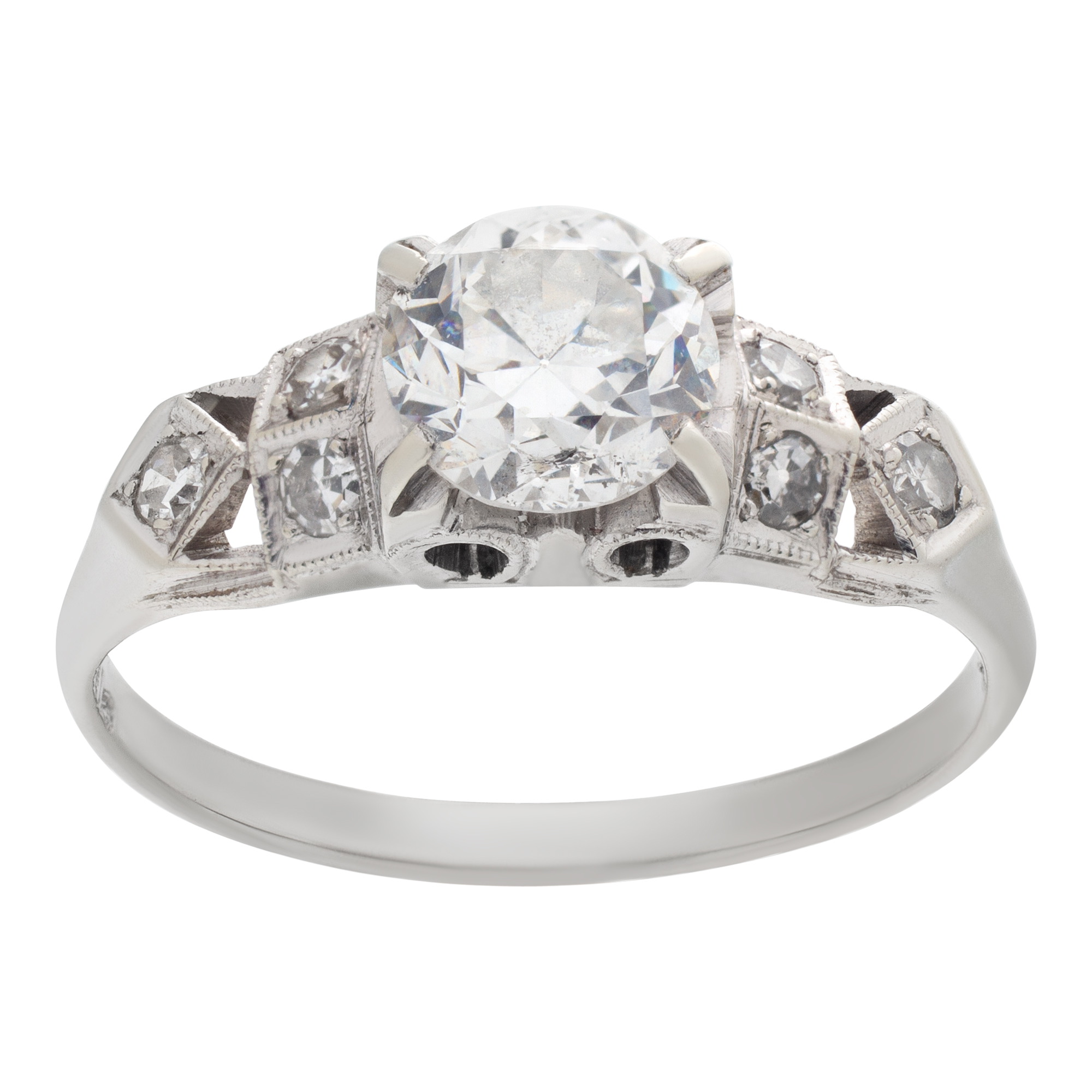 Diamond engagement ring in 18k white gold with app. 0.60 carat center European cut round diamond, and round cut diamond accent on each side.