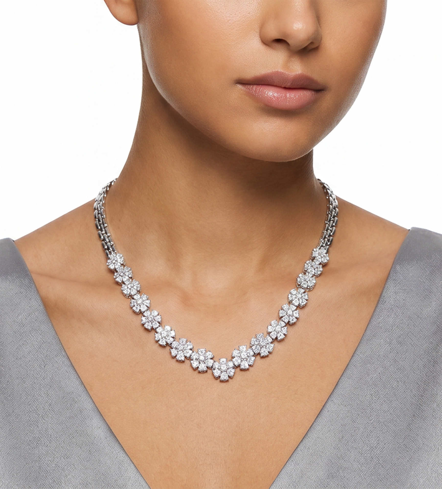 Graduating Diamonds flower necklace in platinum. Round brilliant cut diamonds total approx. weight over 6.00 carats