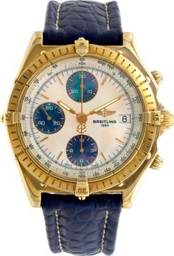 Breitling chronomat in 18k on a blue strap