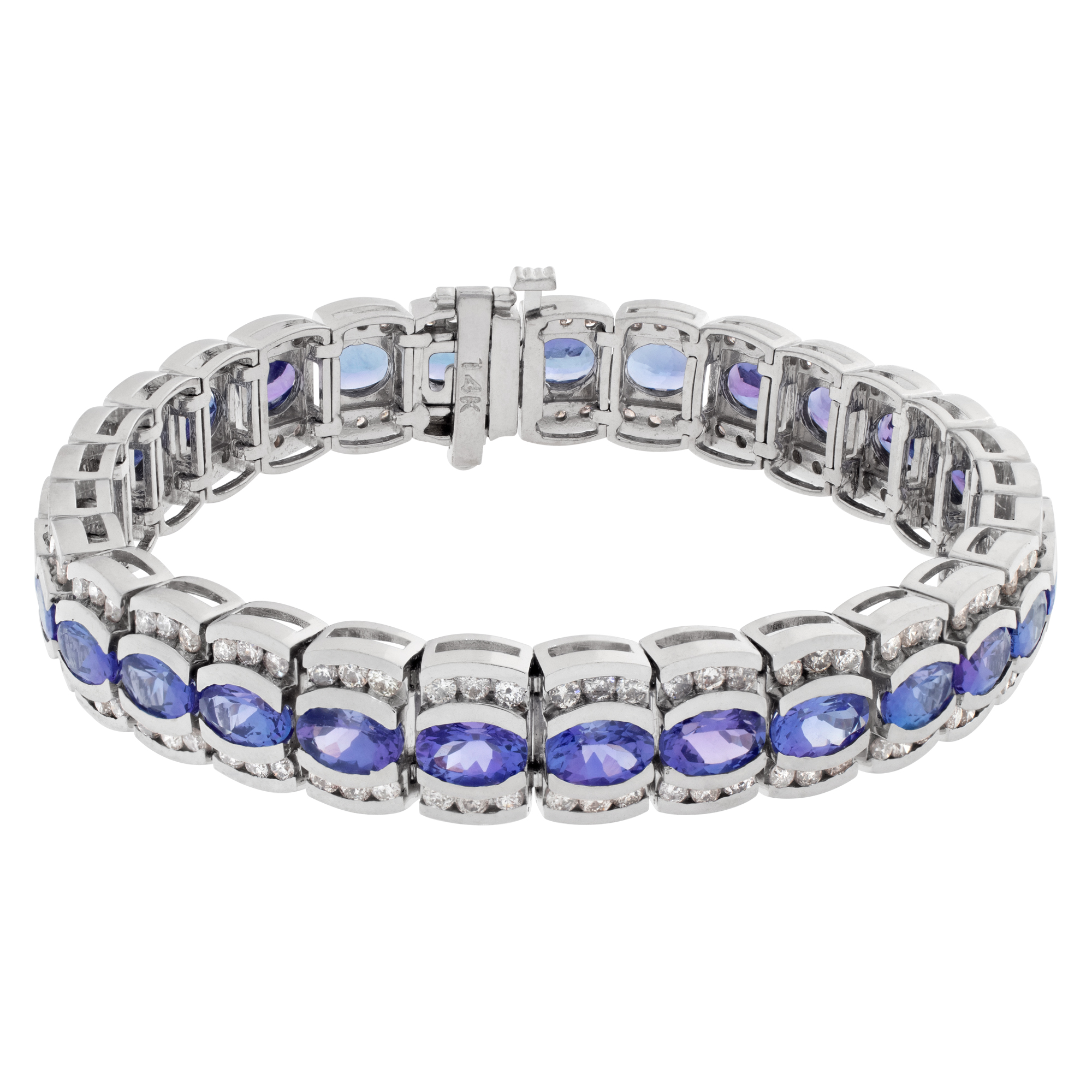 Line bracelet in 14k with 3.95 cts in diamonds and 13.75 cts in tanzanite