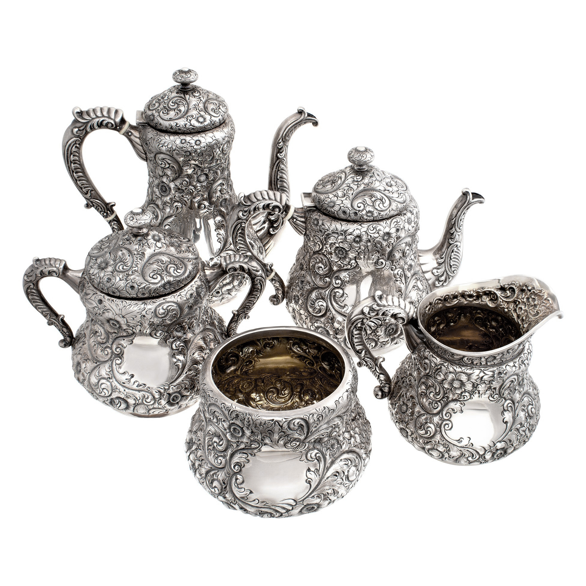 "REPOUSSE" rare, 5 pieces Sterling Silver tea set by HAMILTON & DIESINGER. Circa 1880. over 3026 grams of sterling silver.