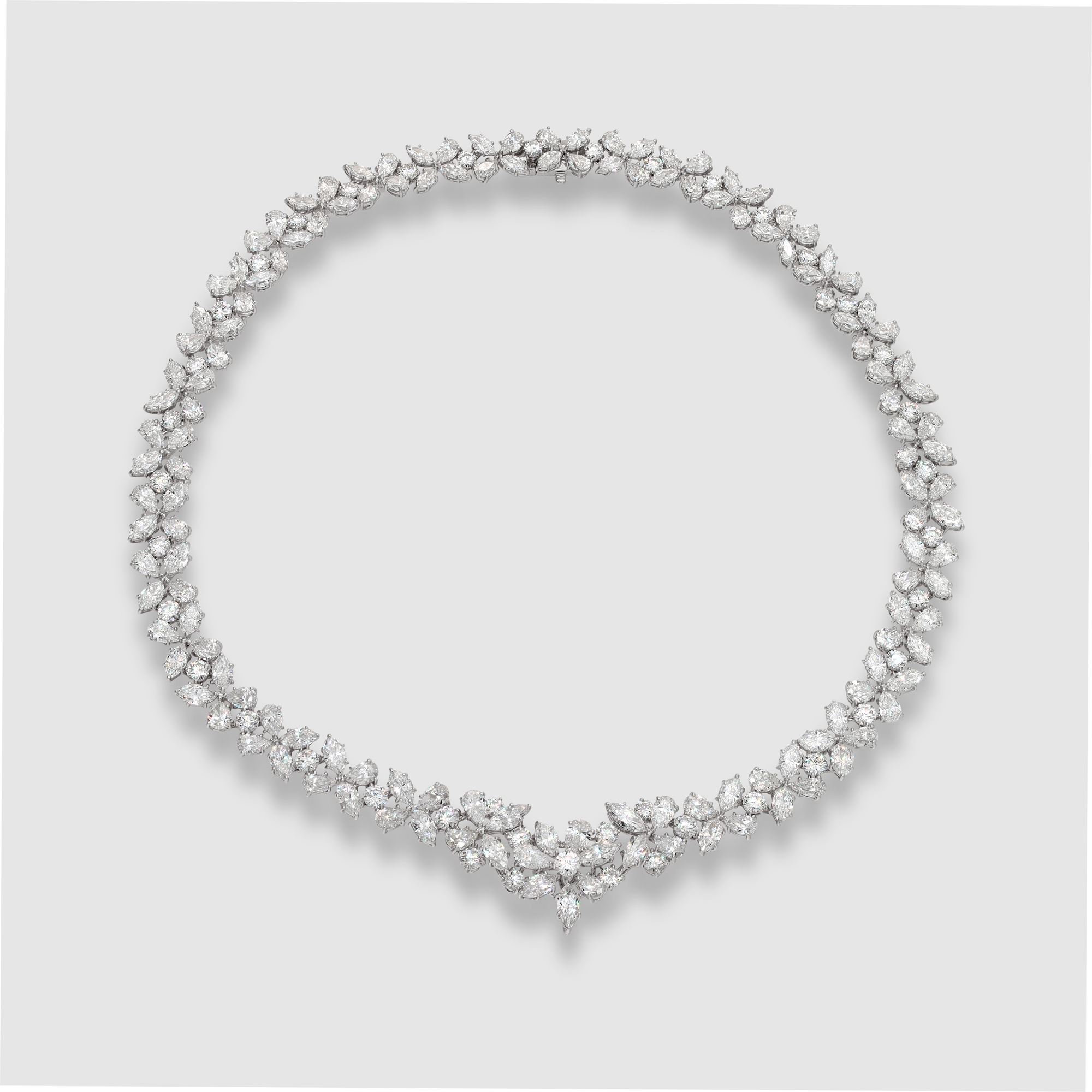 Stunning diamond necklace in 18k white gold. Floral mosaic of Marquise, Pear and Round Brilliant cut Diamonds, total approx. weight: 50.00 carats 17.00 inches long.