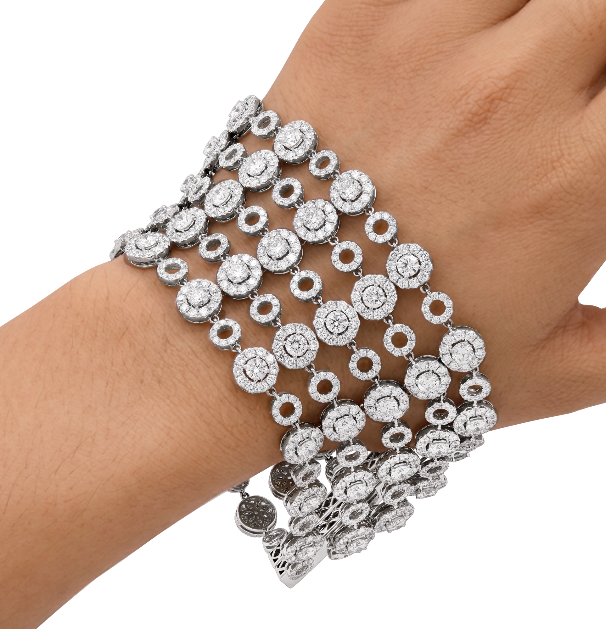 Wide multi-row diamond bracelet in 18k white gold with articulating circular links. Over 37 carats in round diamonds S522326