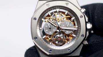 Openworked chronograph watch with visible subdials and tourbillon mechanism