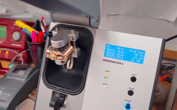 Luxury watch positioned in a Witschi pressure-testing instrument