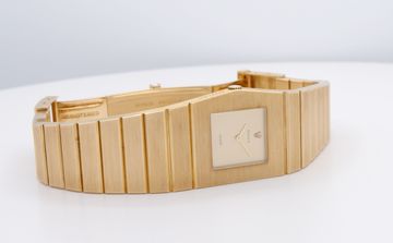 Vintage gold Rolex watch with an integrated geometric bracelet