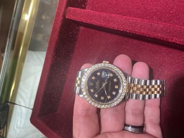 Jeweled two-tone watch photographed during workshop handling