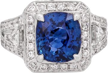 AGL Certified Sapphire ring in 18k white gold diamond setting. 4.68 carats cushion cut unheated Madagascar blue sapphire
