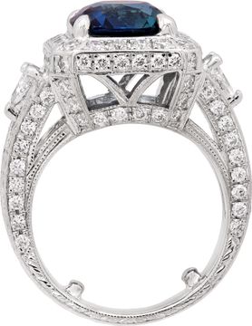 AGL Certified Sapphire ring in 18k white gold diamond setting. 4.68 carats cushion cut unheated Madagascar blue sapphire