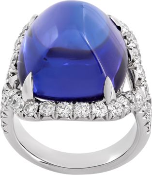 AGl Certified Tanzanite and diamond ring in 18k white gold. 23.28 carat sugarloaf cabochon tanzanite and 1.53 carats in diamonds (E-F color, VS clarity). Ring Collection