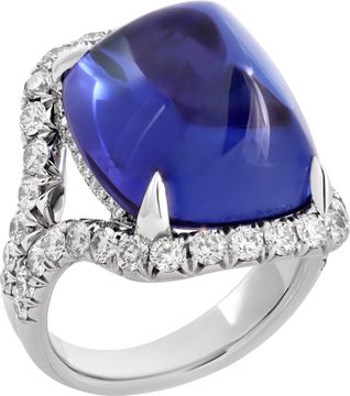 AGl Certified Tanzanite and diamond ring in 18k white gold. 23.28 carat sugarloaf cabochon tanzanite and 1.53 carats in diamonds (E-F color, VS clarity).
