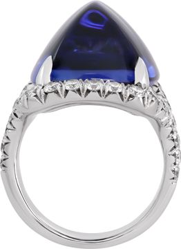 AGl Certified Tanzanite and diamond ring in 18k white gold. 23.28 carat sugarloaf cabochon tanzanite and 1.53 carats in diamonds (E-F color, VS clarity).