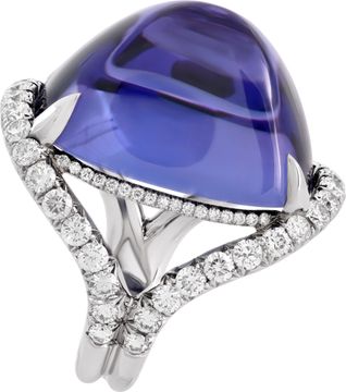 AGL Certified Tanzanite and diamond ring in 18k white gold. 48.32 carat sugarloaf cabochon cut tanzanite and 2.47 carats in diamonds (E-F color, VS clarity).