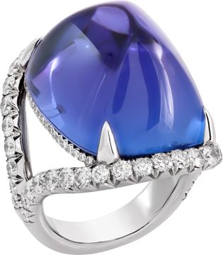 AGL Certified Tanzanite and diamond ring in 18k white gold. 48.32 carat sugarloaf cabochon cut tanzanite and 2.47 carats in diamonds (E-F color, VS clarity).