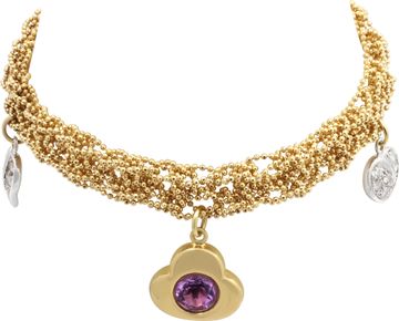 Amethyst and Diamond Bracelet in 18k yellow and white gold with heart charms