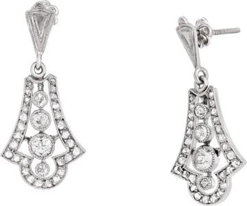 Antique dangling earrings filligree style set in platinum with diamonds