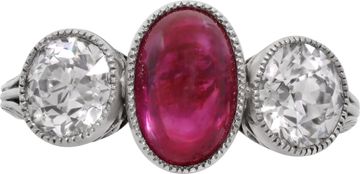 Antique three stone ruby and diamond ring crafted in 18k yellow gold
