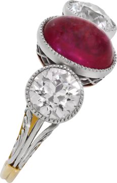 Antique three stone ruby and diamond ring crafted in 18k yellow gold
