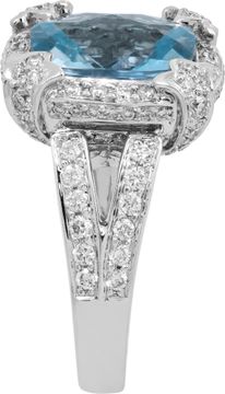 Aquamarine cusion shape center faceted ring