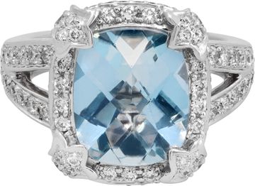 Aquamarine cusion shape center faceted ring