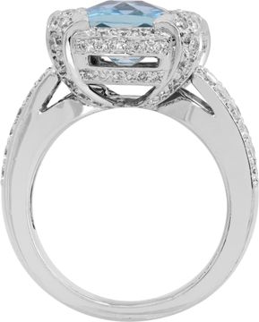 Aquamarine cusion shape center faceted ring
