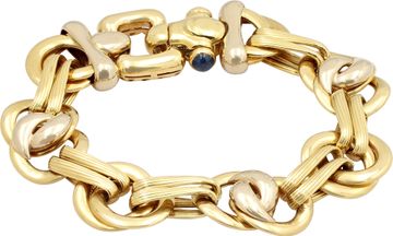 Blue Topaz Cabochon bracelet in 18k Yellow Gold Blue Topaz Cabochon bracelet in 18k Yellow Gold Bracelet Collection