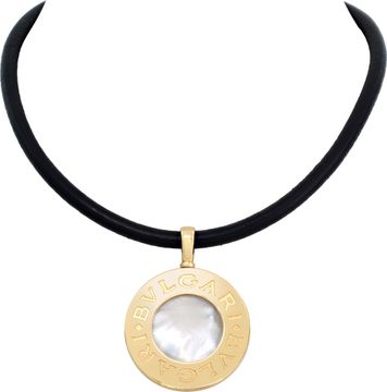 Bvlgari mother of pearl and onyx pendant in 18k and stainless steel on a black cord necklace.