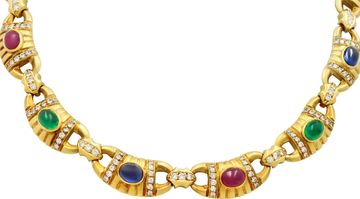 Cabochon ruby, emerald, and sapphire necklace with diamond accents, all beautifully mounted in 18k yellow gold