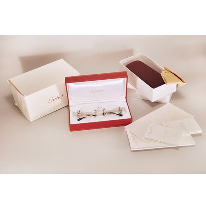 Cartier frameless glasses in gold plate | Gray & Sons Jewelers