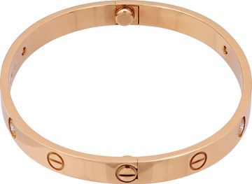 Cartier Love Bracelet in 18k rose gold with 4 diamonds. Size 18. Classic Model.