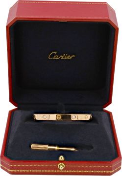 Cartier Love Bracelet in 18k rose gold with 4 diamonds. Size 18. Classic Model.