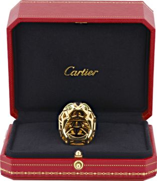 Cartier Panthere ring in 18k yellow gold with green tsavorite eyes and onyx nose