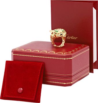 Cartier Panthere ring in 18k yellow gold with green tsavorite eyes and onyx nose