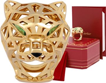 Cartier Panthere ring in 18k yellow gold with green tsavorite eyes and onyx nose Ring Collection
