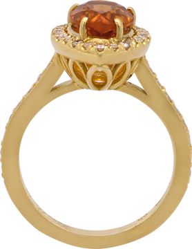 Citrine and diamond ring in 18k yellow gold with approximately 1.50 carat central pear shaped Citrine surrounded by 0.40 carats in round diamonds.