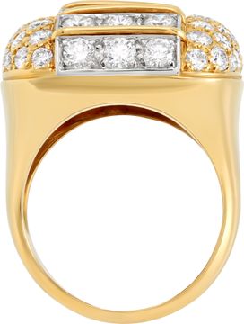 Cushion diamond cocktail ring in 18k with over 5.00 carats round cut brilliant diamonds: G-H color, VVS-VS clarity. Size 6.