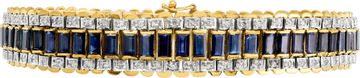 Diamond and blue sapphire line bracelet in 18k yellow gold