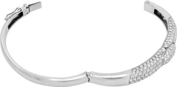 Diamond bangle in platinum with over 5 carats in round diamonds (G-H Color, VS Clarity).