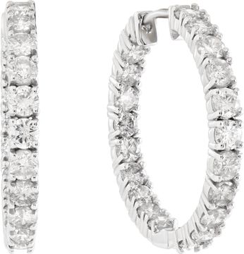 Diamond hoop earrings in 14k white gold with approximately 6.7 carats in round diamonds (G-H color, VS-SI clarity). 1.25 inch diameter