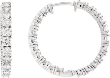Diamond hoop earrings in 14k white gold with approximately 6.7 carats in round diamonds (G-H color, VS-SI clarity). 1.25 inch diameter