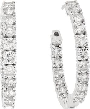 Diamond hoop earrings in 14k white gold with approximately 6.7 carats in round diamonds (G-H color, VS-SI clarity). 1.25 inch diameter