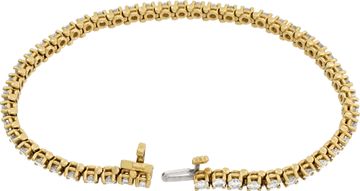 Diamond line bracelet in 14k yellow gold with over 4 carats in round diamonds (I-J color, SI clarity).