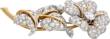 Diamond Rose Brooch In Platinum and 18K yellow gold.