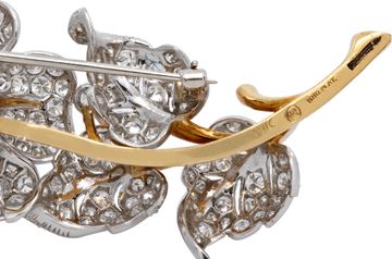 Diamond Rose Brooch In Platinum and 18K yellow gold.