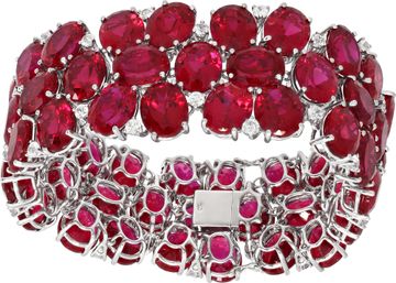 Diamonds & over 200 carats oval lab grown ruby wide bracelet in 18k yellow gold Diamonds & oval lab grown ruby wide bracelet in 18k yellow gold. oval cut Lab grown ruby approx. 200 carats