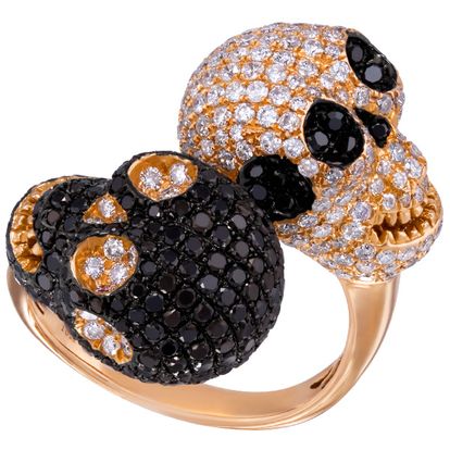 Double Skull Ring in 18k rose with white and black