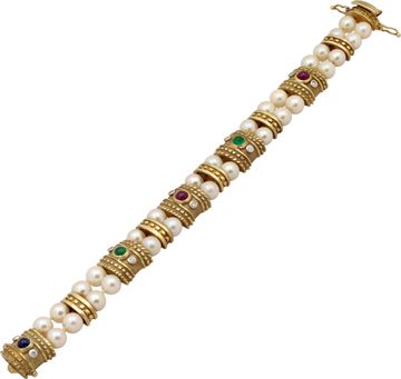 Cabochon ruby, sapphire, and emerald bracelet in 14k yellow gold with pearls