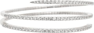 Flexible diamond coil bangle in 18k white gold. 7.32 carats in round diamonds.