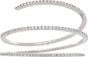 Flexible diamond coil bangle in 18k white gold. 7.32 carats in round diamonds.